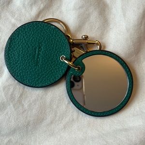 Coach mirror/charm with embroidery